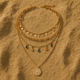 Collier Multi-rangs doré & médaillon solaire | Francesca