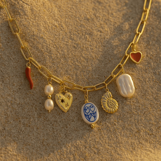 Collier charms femme – acier doré & breloques talisman | L’Atelier de Malte